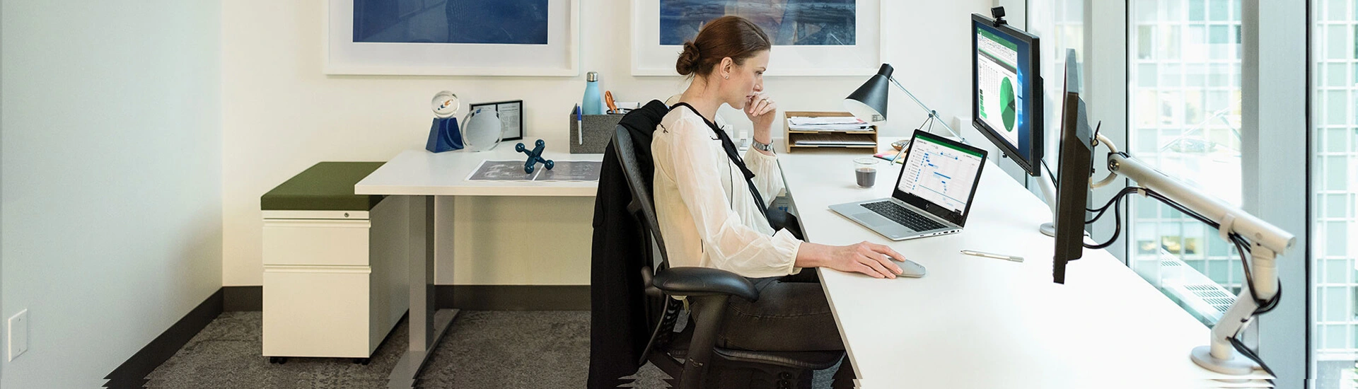 Person working in office on Microsoft